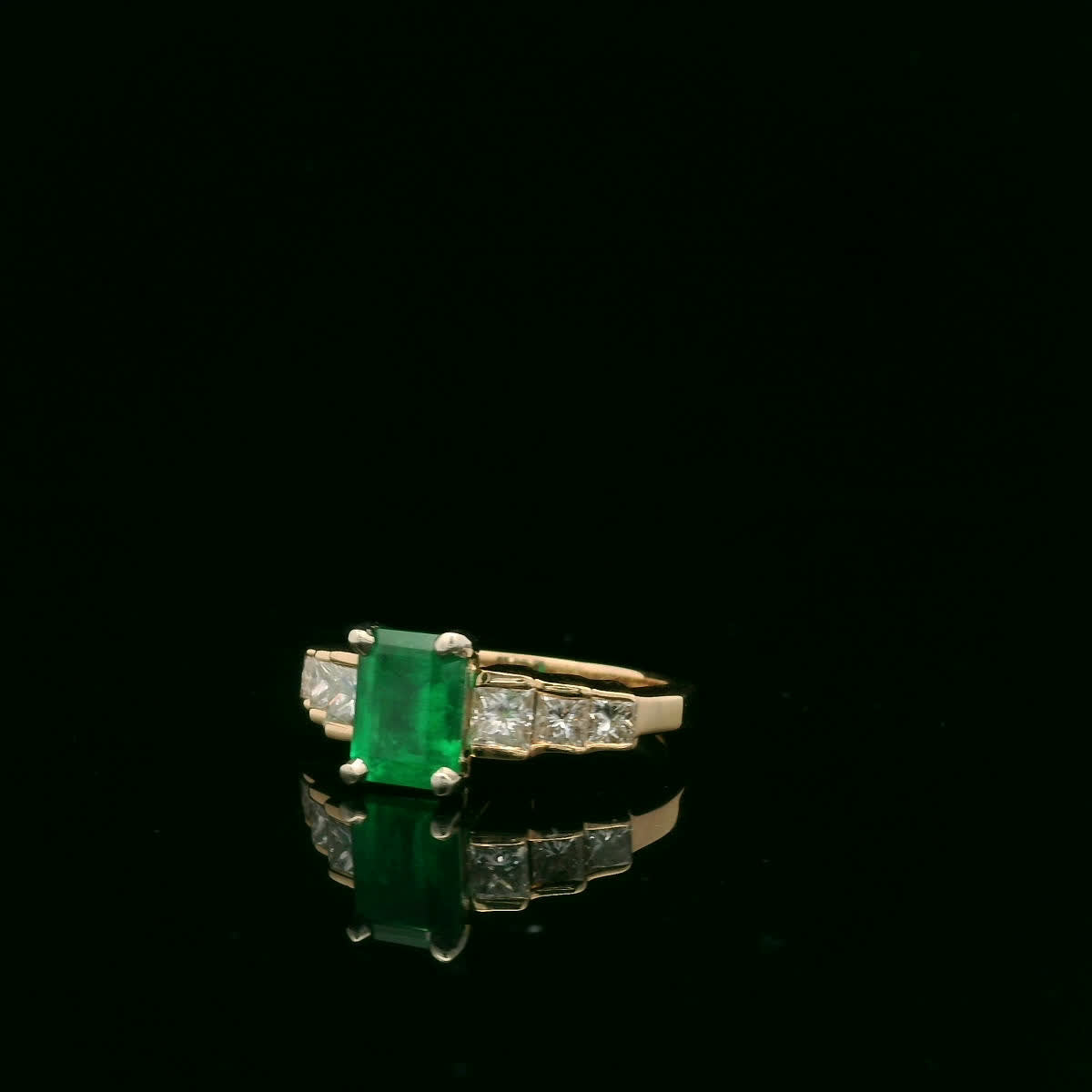Elegant Emerald and Diamond Ring